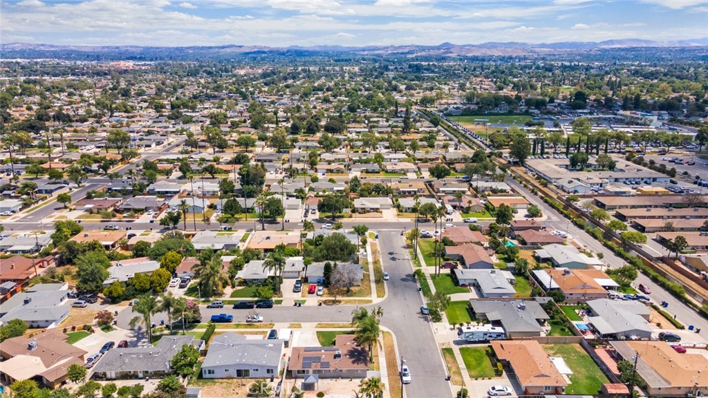 8955 Holly Lane Riverside, CA 92503 - Photo 30 of 32 an aerial view of a city with lots of residential buildings