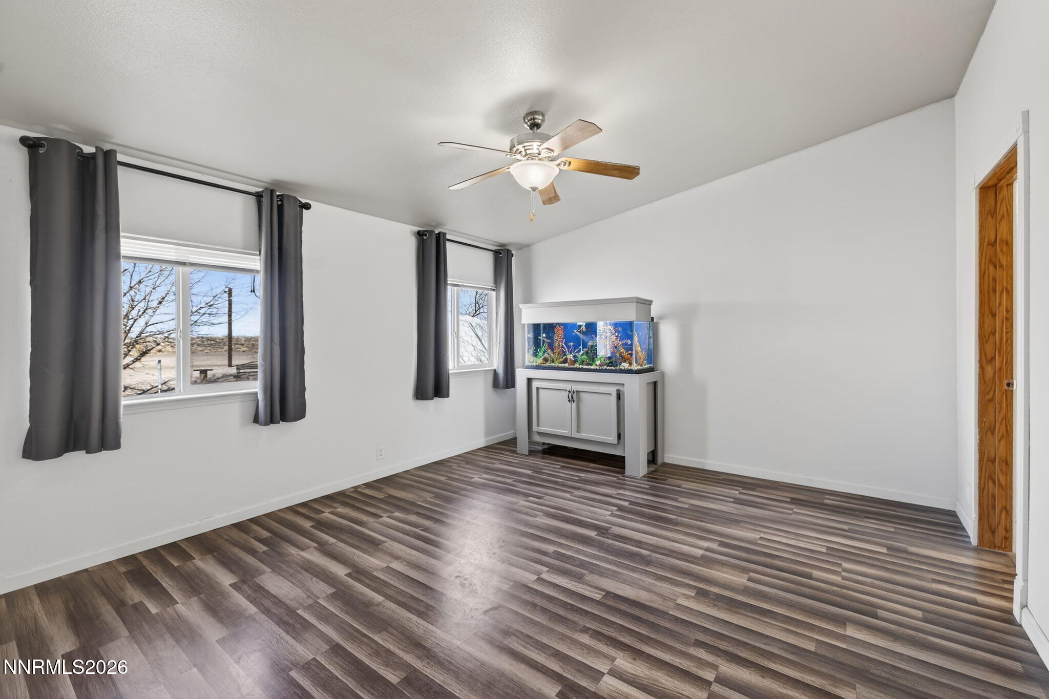5430 Cox Road Fallon, NV 89406 - Photo 15 of 50 a view of a room with wooden floor and cabinet