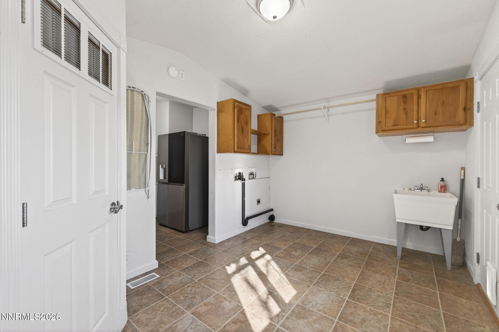 5430 Cox Road Fallon, NV 89406 - Photo 22 of 50 a view of a storage & utility room with a window