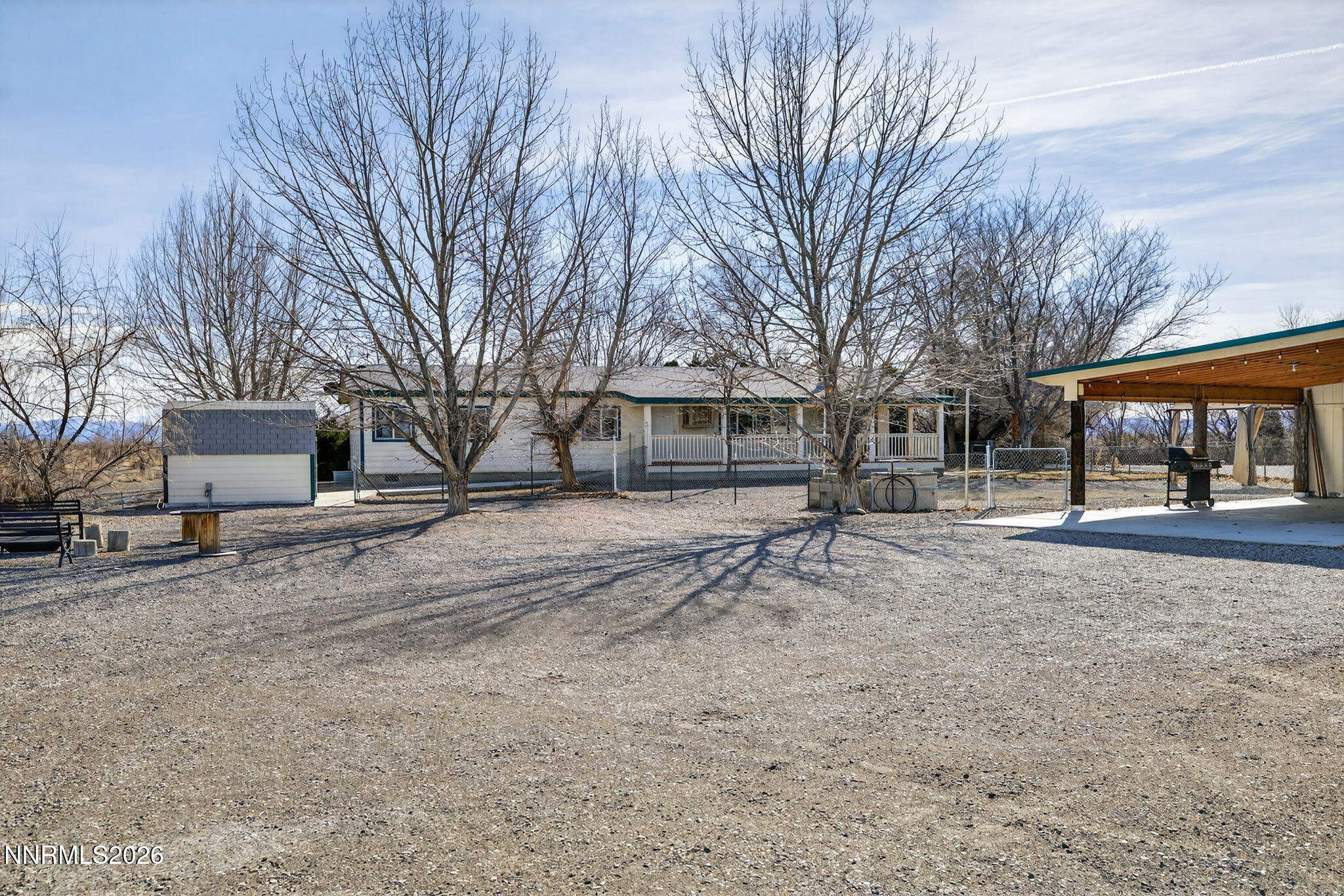 5430 Cox Road Fallon, NV 89406 - Photo 24 of 50 a view of a house with a yard and garage