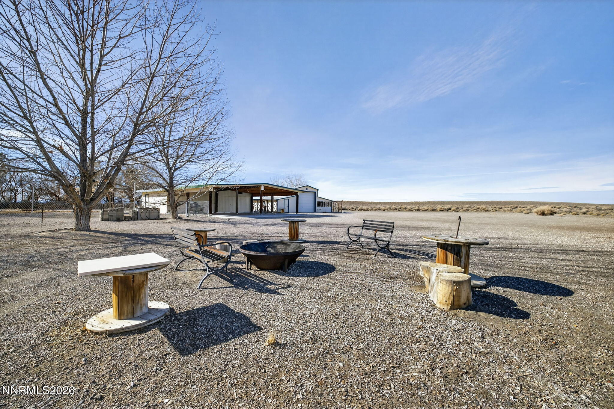 5430 Cox Road Fallon, NV 89406 - Photo 29 of 50 a view of a water with lawn chairs and a fire pit