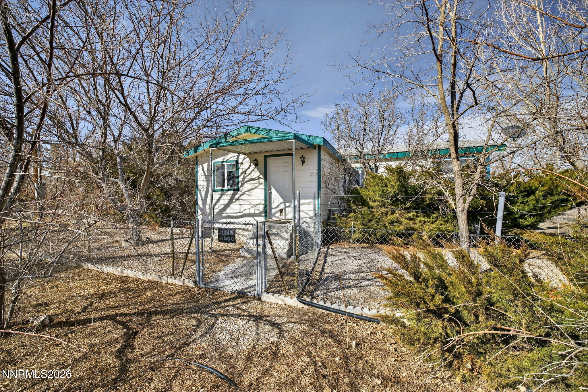 5430 Cox Road Fallon, NV 89406 - Photo 30 of 50 a front view of a house with a yard