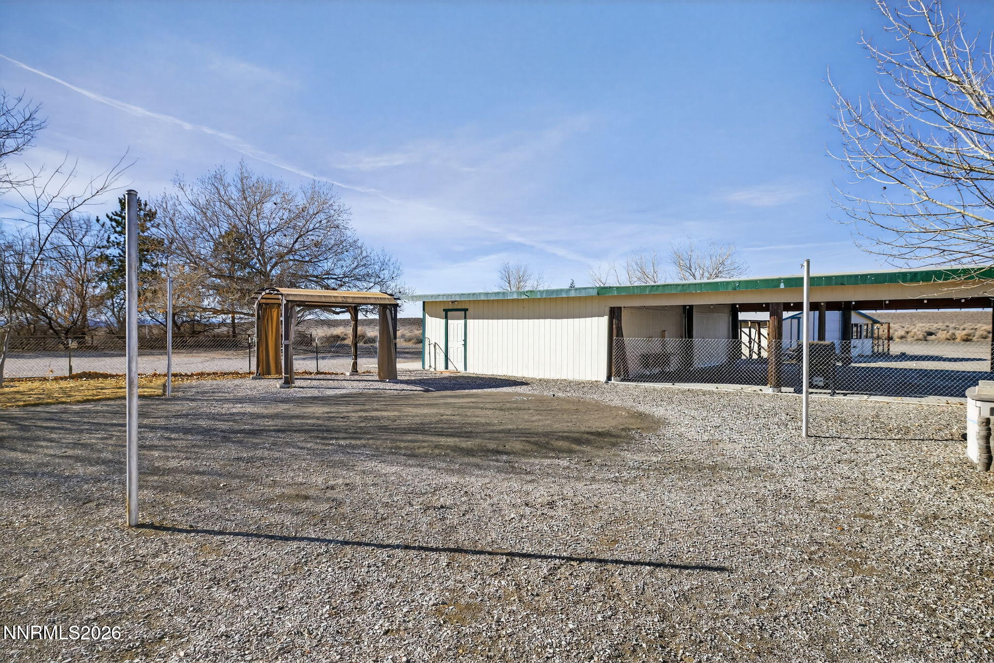 5430 Cox Road Fallon, NV 89406 - Photo 34 of 50 a view of a house with a yard