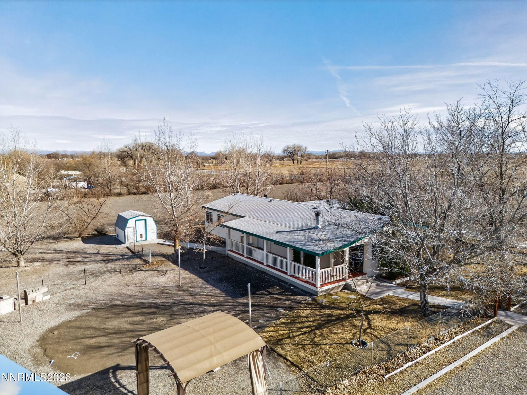 5430 Cox Road Fallon, NV 89406 - Photo 43 of 50 a view of a terrace with a flat screen tv