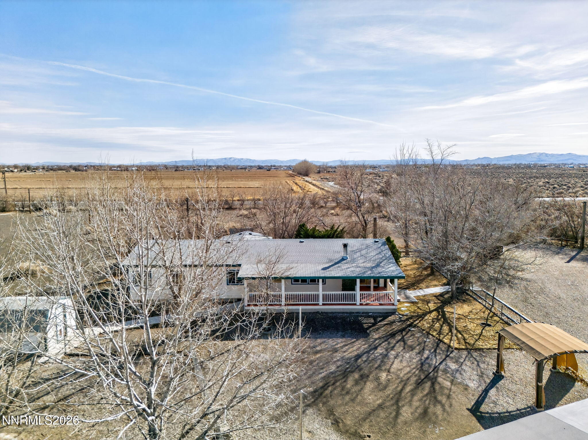 5430 Cox Road Fallon, NV 89406 - Photo 44 of 50 a view of a house with a mountain