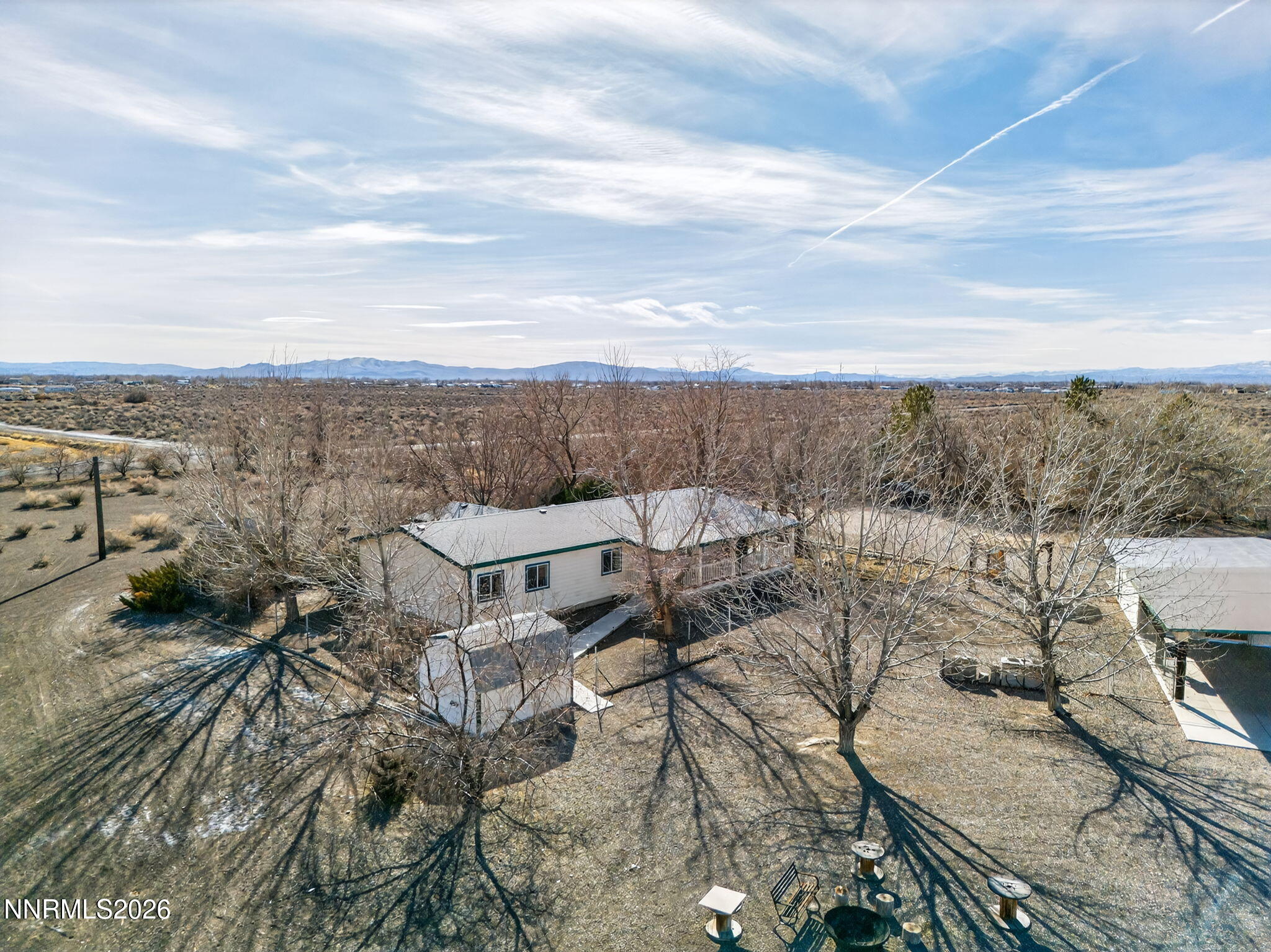 5430 Cox Road Fallon, NV 89406 - Photo 45 of 50 a view of a terrace with a bench