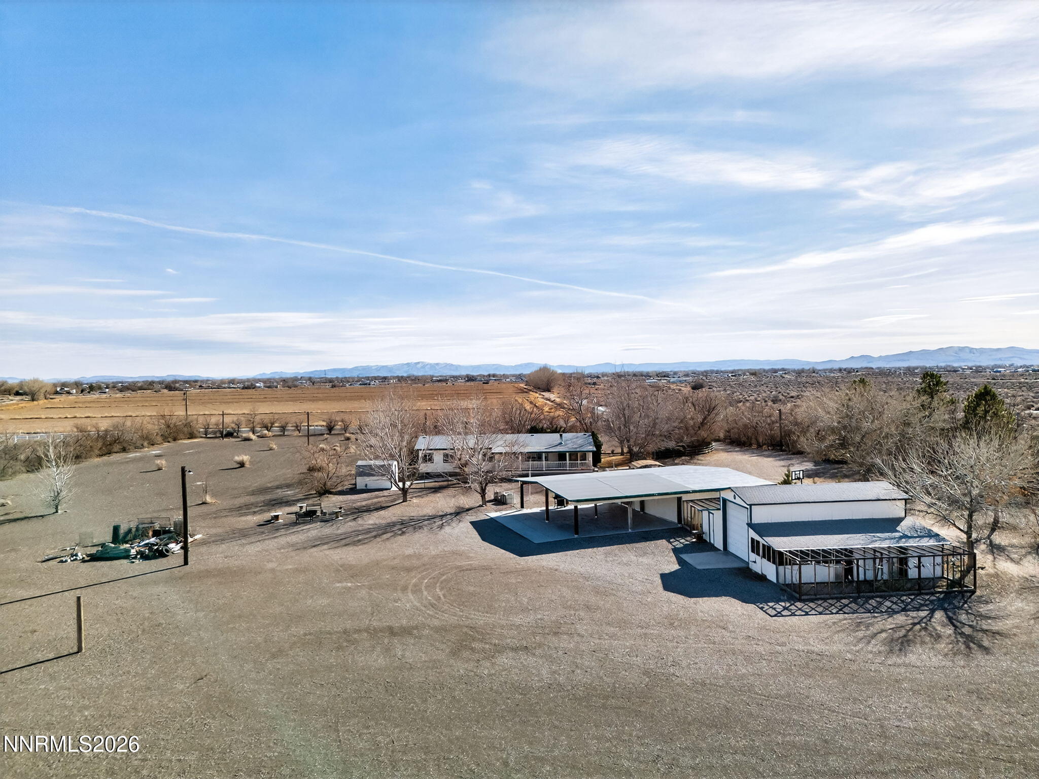 5430 Cox Road Fallon, NV 89406 - Photo 48 of 50 an aerial view of a terrace with lawn chairs