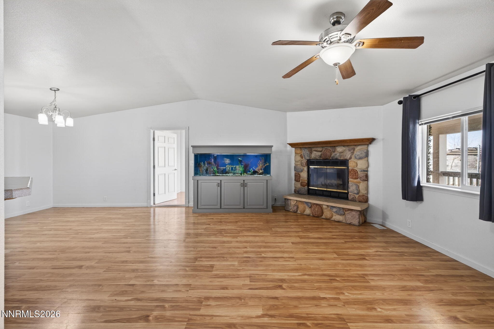 5430 Cox Road Fallon, NV 89406 - Photo 7 of 50 a view of livingroom with furniture flat screen tv and ceiling fan