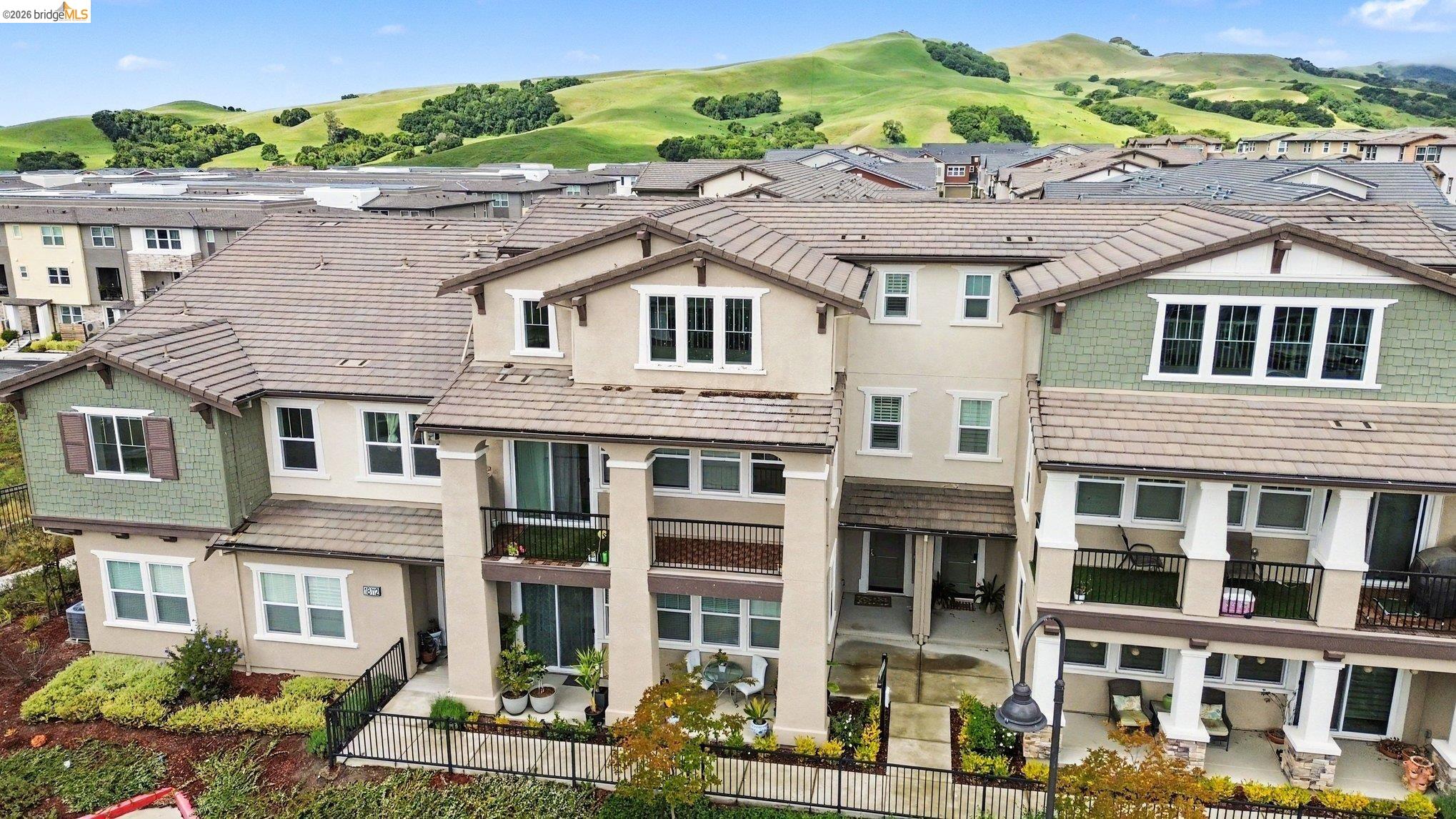 18210 Argento Loop San Ramon, CA 94583 - Photo 4 of 43 Contemporary multi-story townhomes featuring varied facade treatments