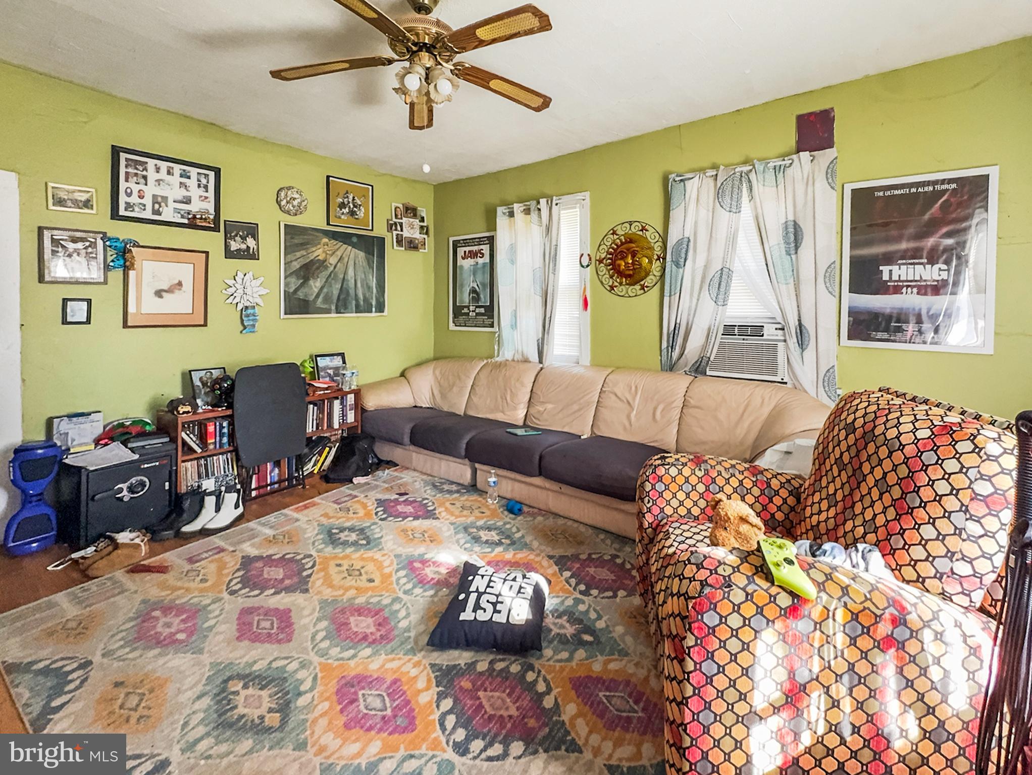619 Main Street Leesburg, NJ 08327 - Photo 15 of 23 a living room with furniture and painting on the wall