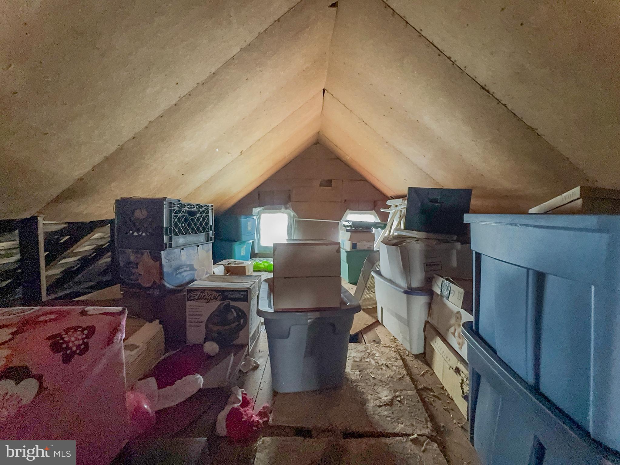 619 Main Street Leesburg, NJ 08327 - Photo 19 of 23 a living room with furniture a flat screen tv and a fireplace