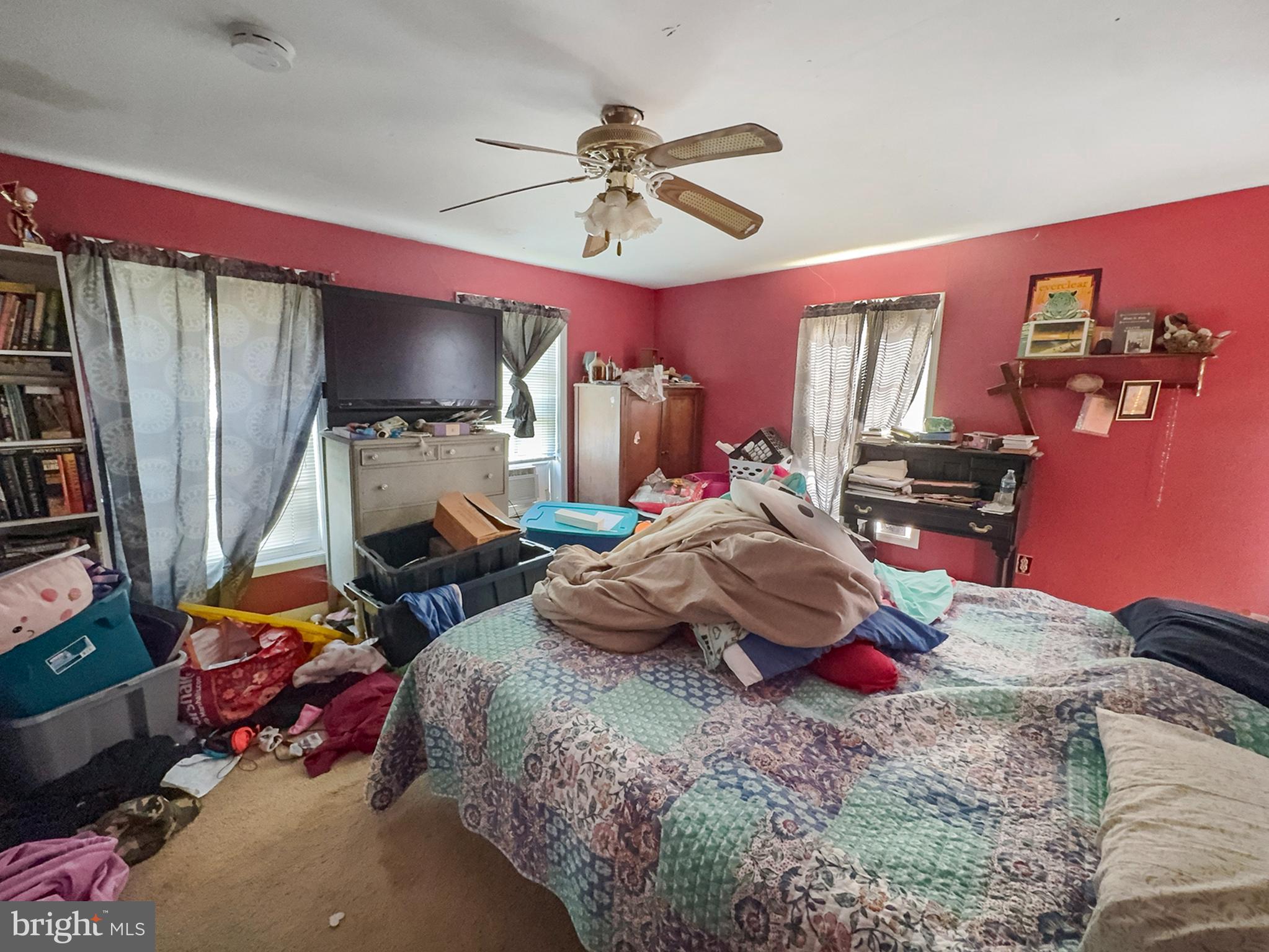 619 Main Street Leesburg, NJ 08327 - Photo 3 of 23 a bedroom with bed and a flat screen tv