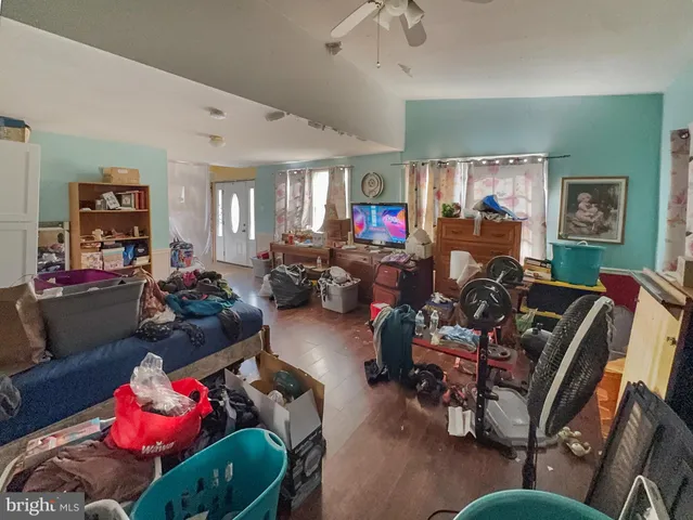 a room with gym equipment and a large window