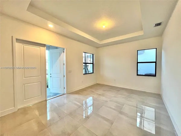 an empty room with windows