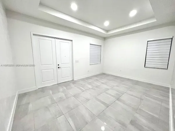 an empty room with windows