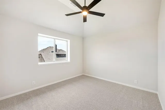 a bathroom with a granite countertop sink a toilet and bathtub