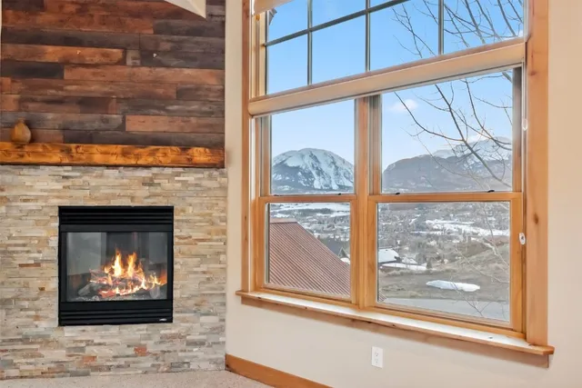 a living room with a fireplace