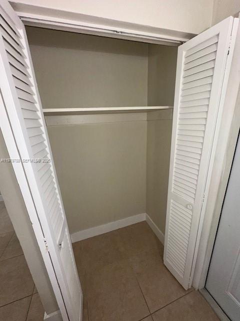 7500 Southwest 82nd Street, Unit G110 Miami, FL 33143 - Photo 6 of 13 a view of a room with door