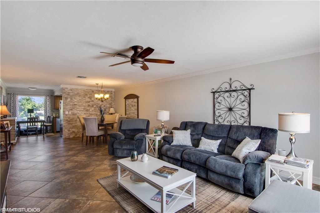 787 Palm View Drive, Unit 3 Naples, FL 34110 - Photo 2 of 19 a living room with furniture