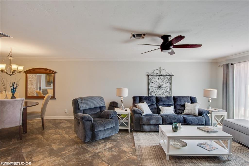 787 Palm View Drive, Unit 3 Naples, FL 34110 - Photo 3 of 19 a living room with furniture