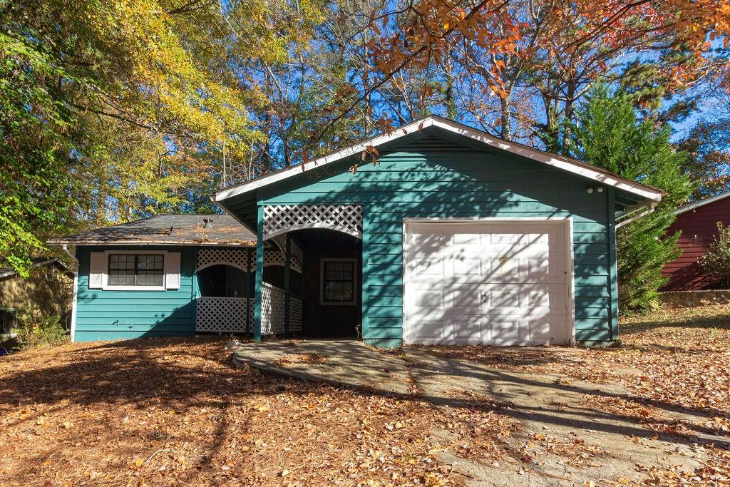 773 Villa Way Jonesboro, GA 30238 - Photo 1 of 1 a front view of a house with a yard and garage