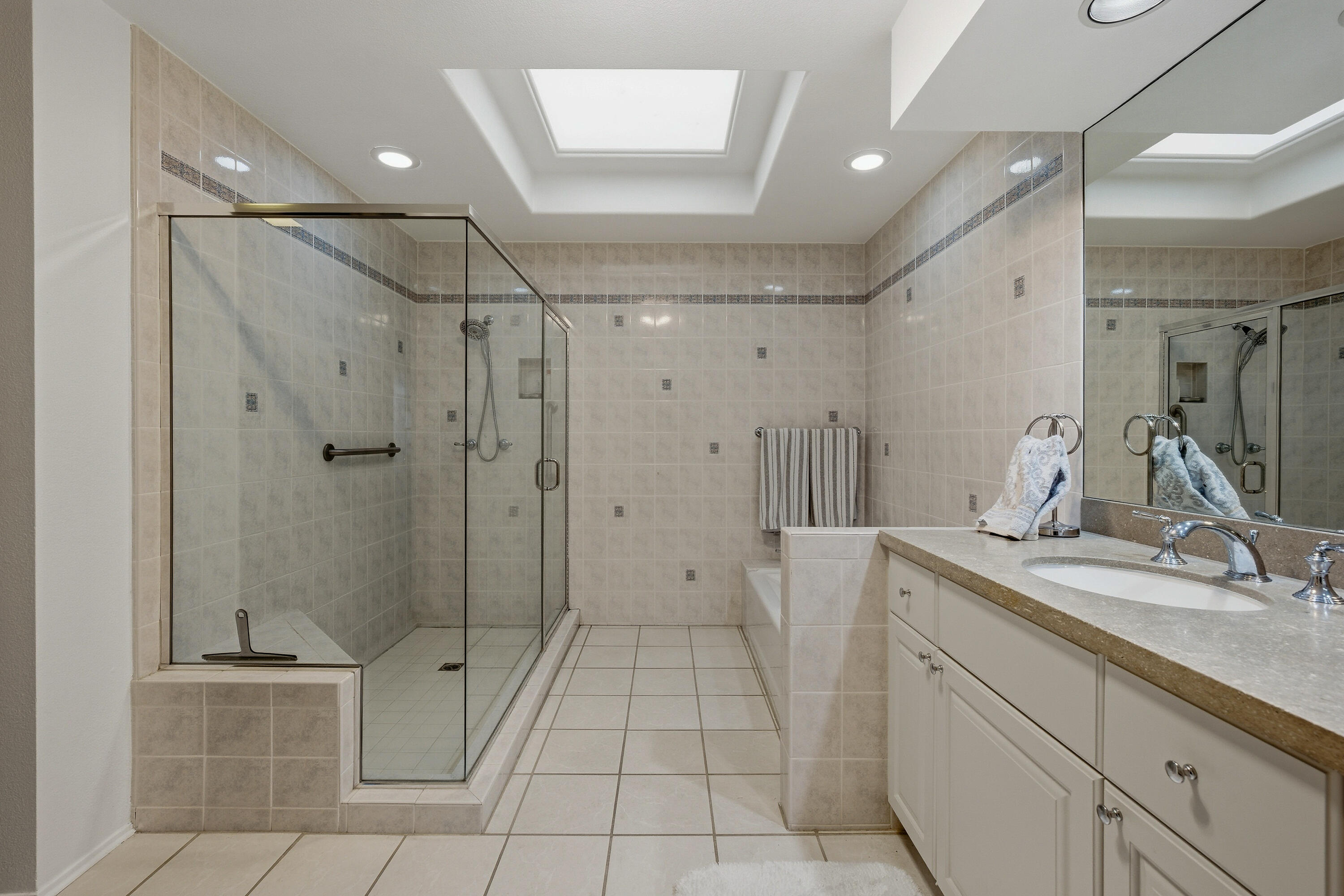 27 Cornell Drive Rancho Mirage, CA 92270 - Photo 17 of 58 a bathroom with a sink a toilet and shower