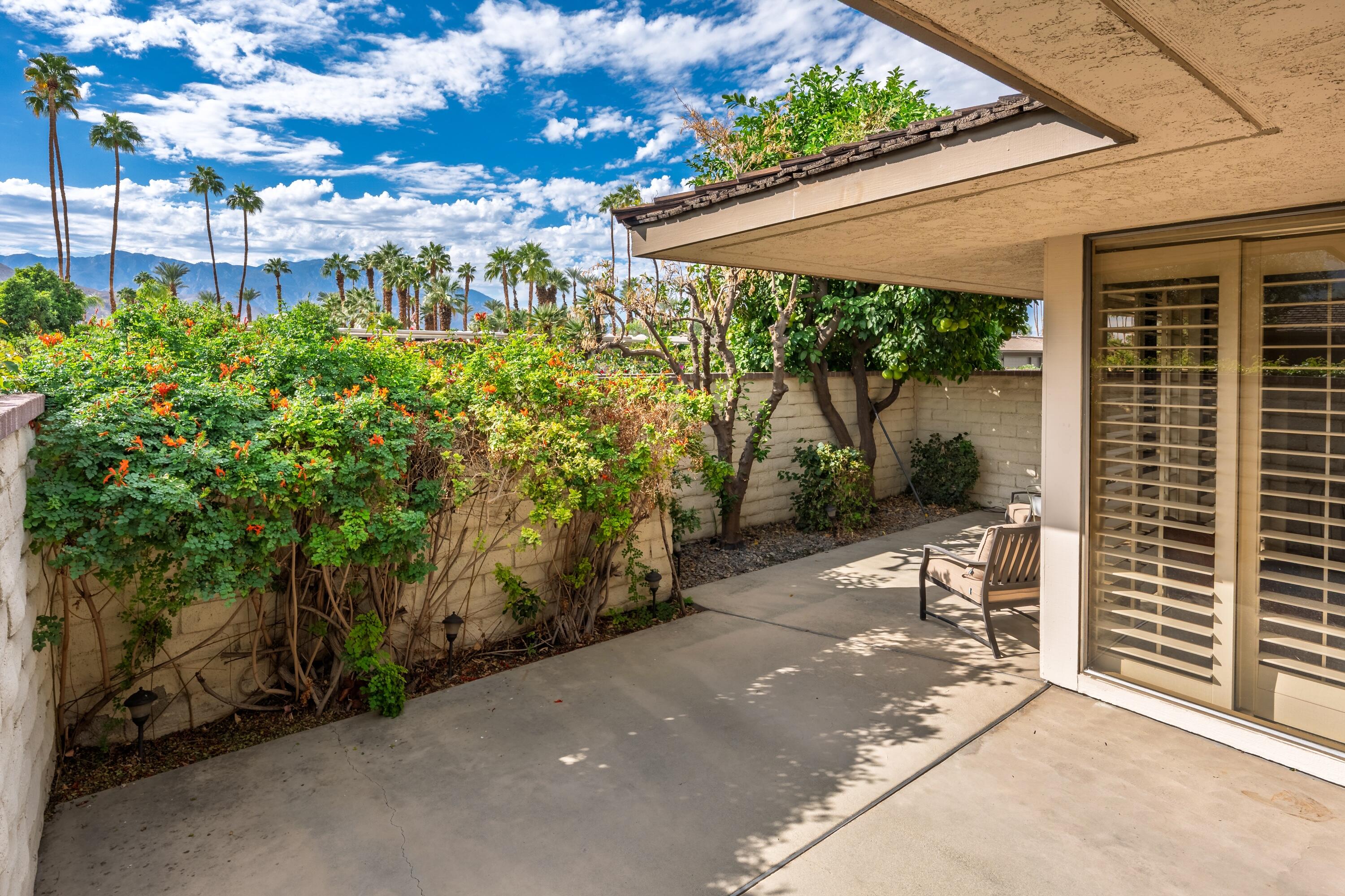 27 Cornell Drive Rancho Mirage, CA 92270 - Photo 21 of 58 a view of a backyard with garden