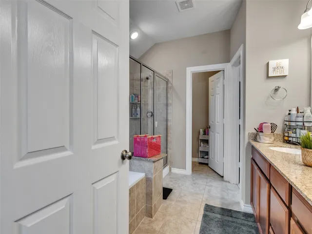 a room with a sink and a window