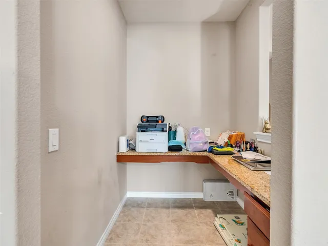 a view of a porch with seating space