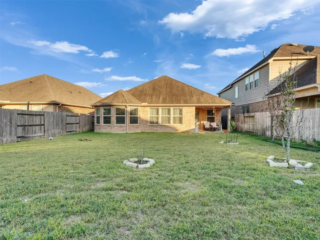 a view of a house with a big yard
