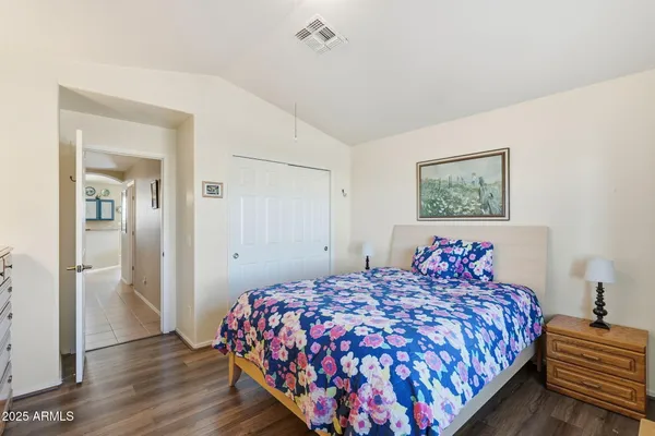 a building outdoor space with patio furniture and potted plants