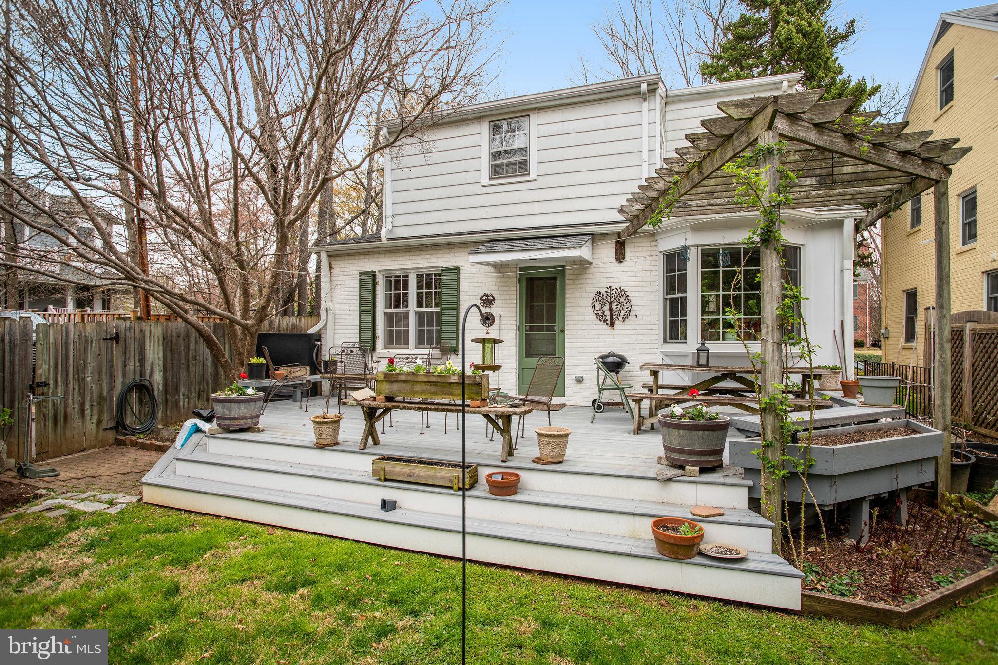 4920 43rd Place Northwest Washington, DC 20016 - Photo 25 of 25 a view of a house with backyard porch and sitting area
