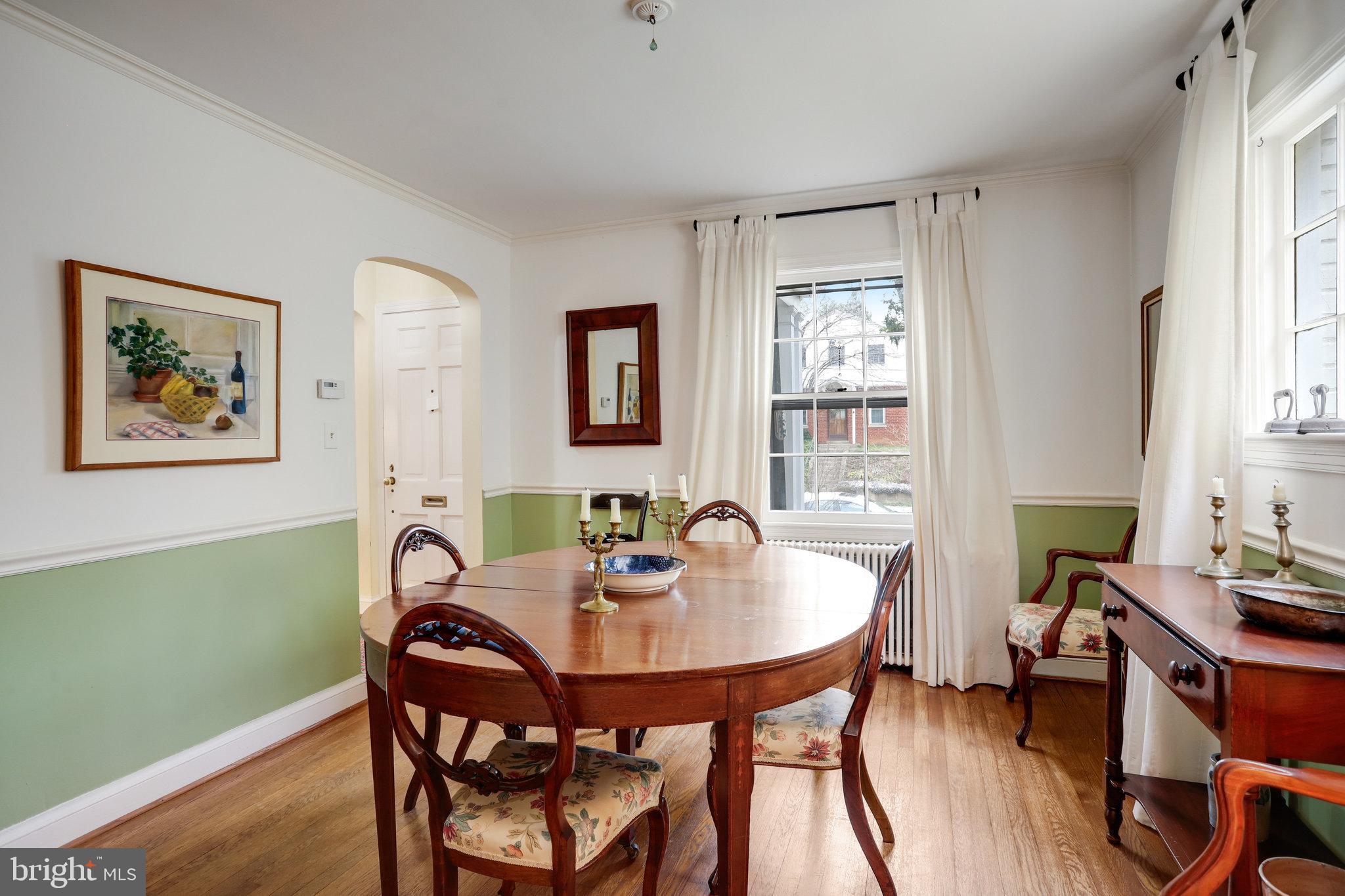 4920 43rd Place Northwest Washington, DC 20016 - Photo 8 of 25 a view of a dining room with furniture window and outside view