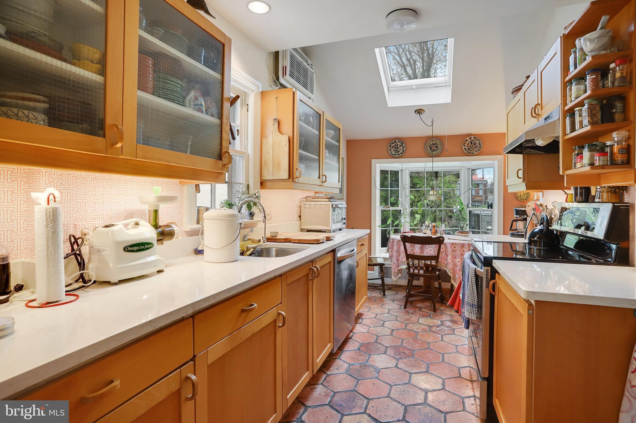 4920 43rd Place Northwest Washington, DC 20016 - Photo 9 of 25 a large kitchen with a large window