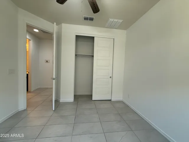 an empty room with a bathroom