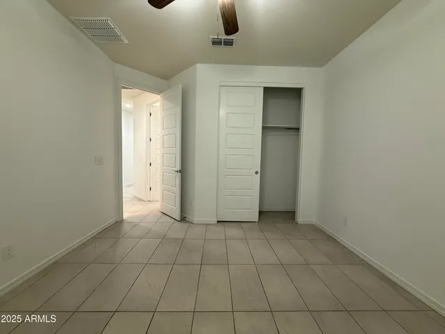 an empty room with a bathroom