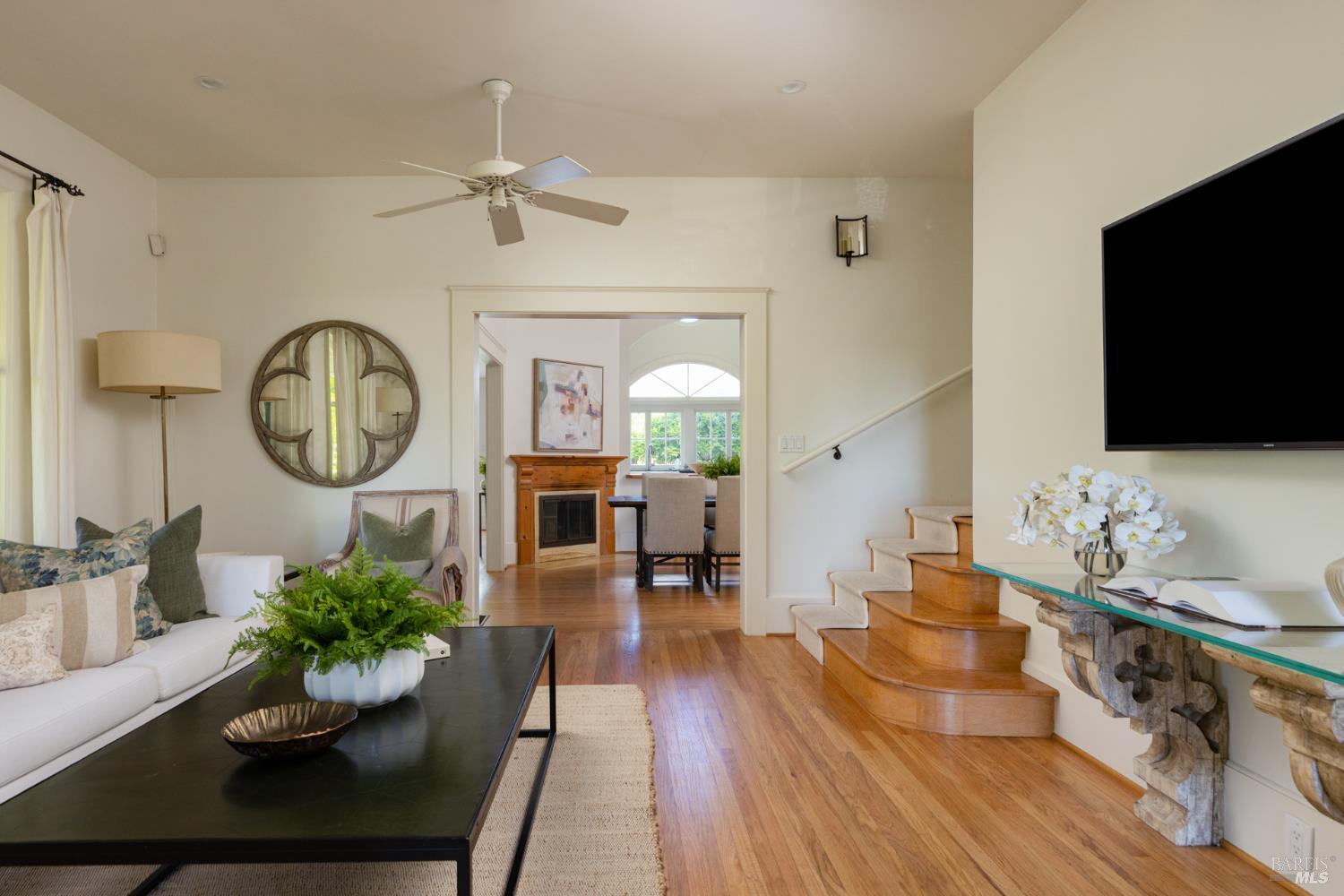1410 Adams Street St. Helena, CA 94574 - Photo 11 of 46 a living room with furniture a rug and a flat screen tv