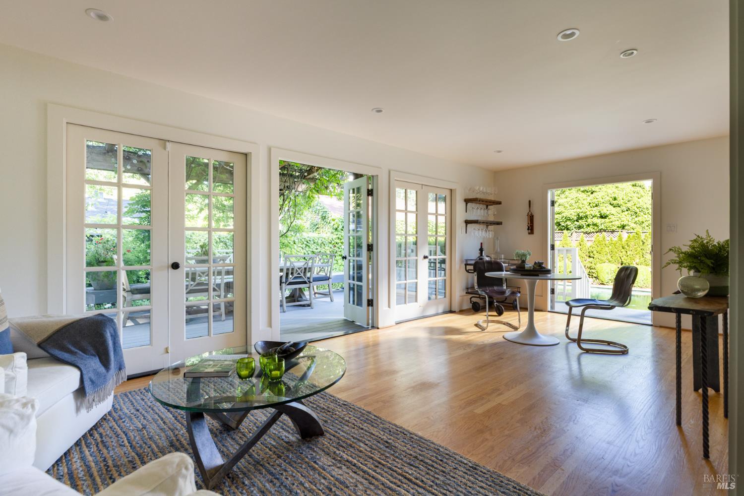1410 Adams Street St. Helena, CA 94574 - Photo 16 of 46 a living room with furniture and a wooden floor