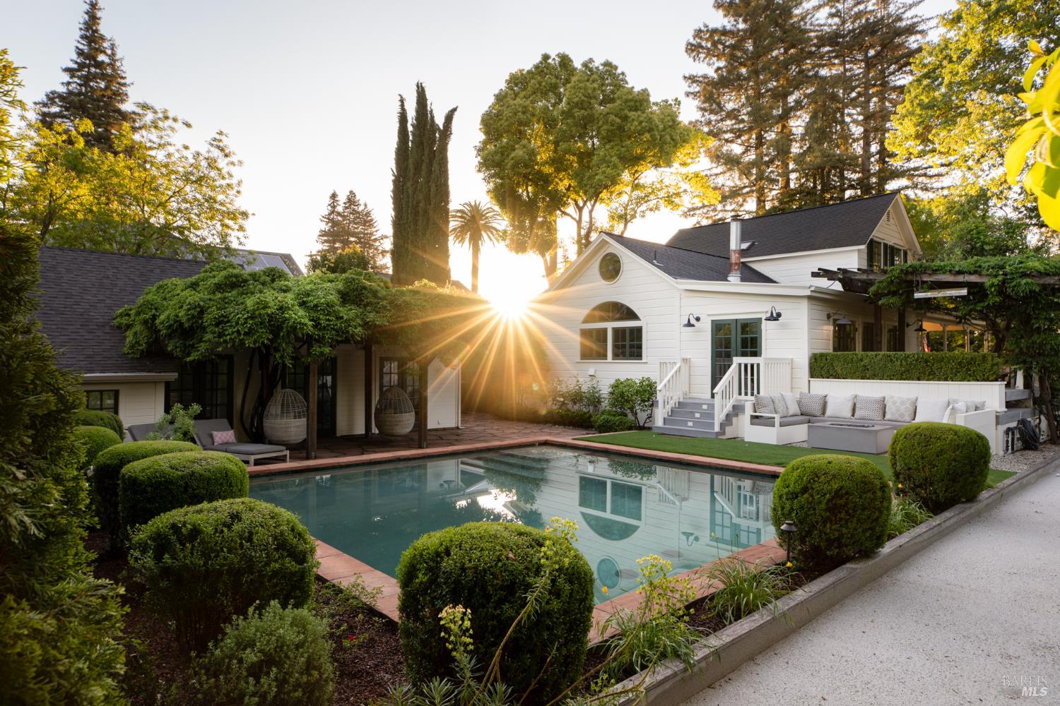 1410 Adams Street St. Helena, CA 94574 - Photo 2 of 46 a front view of a house with garden