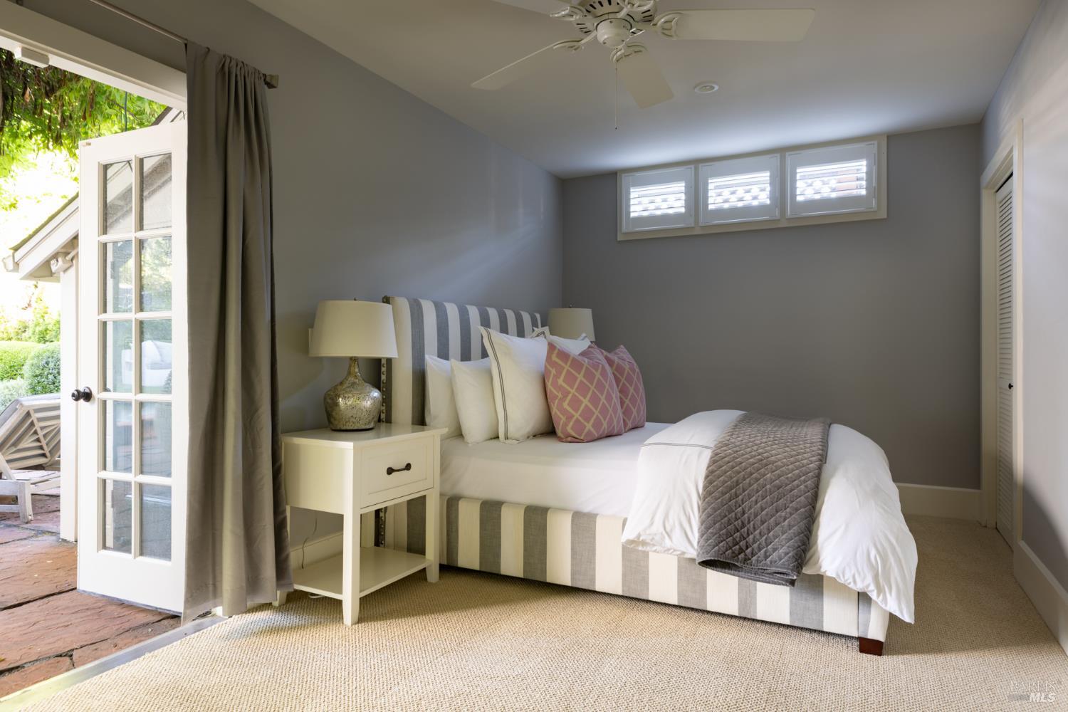 1410 Adams Street St. Helena, CA 94574 - Photo 37 of 46 a bedroom with a bed and a window