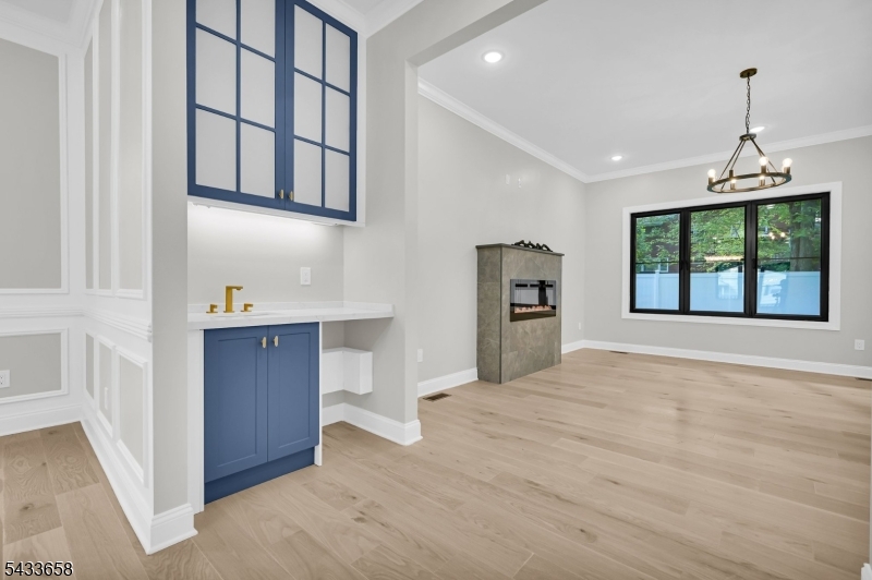 2 Orchard Road Florham Park, NJ 07932 - Photo 9 of 23 a view of an empty room with a window and fireplace