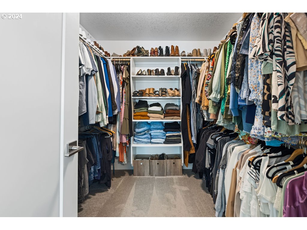 327 South 39th Drive Ridgefield, WA 98642 - Photo 29 of 48 a view of walk in closet with clothes and shoes