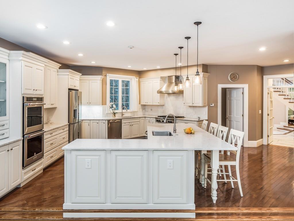 5 Duston Lane Acton, MA 01720 - Photo 11 of 39 a kitchen with counter top space cabinets and stainless steel appliances