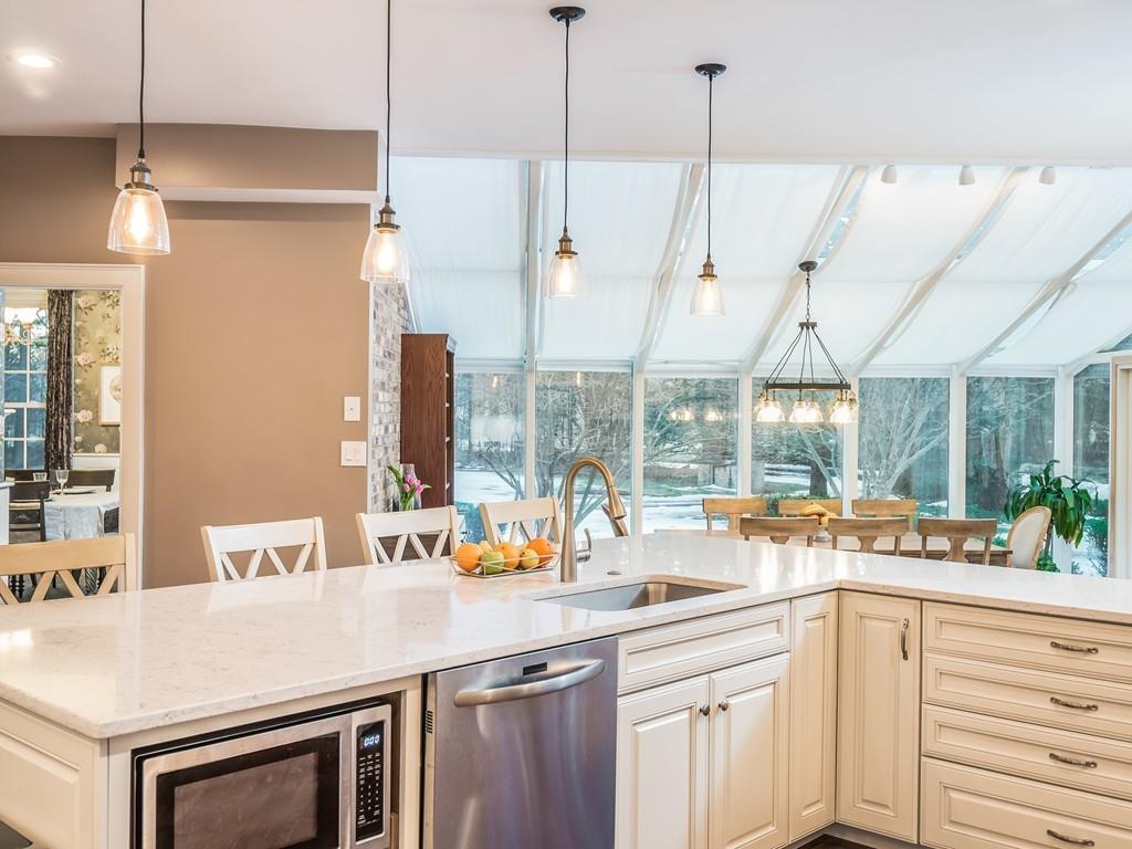 5 Duston Lane Acton, MA 01720 - Photo 13 of 39 a kitchen with a sink a counter and a large window