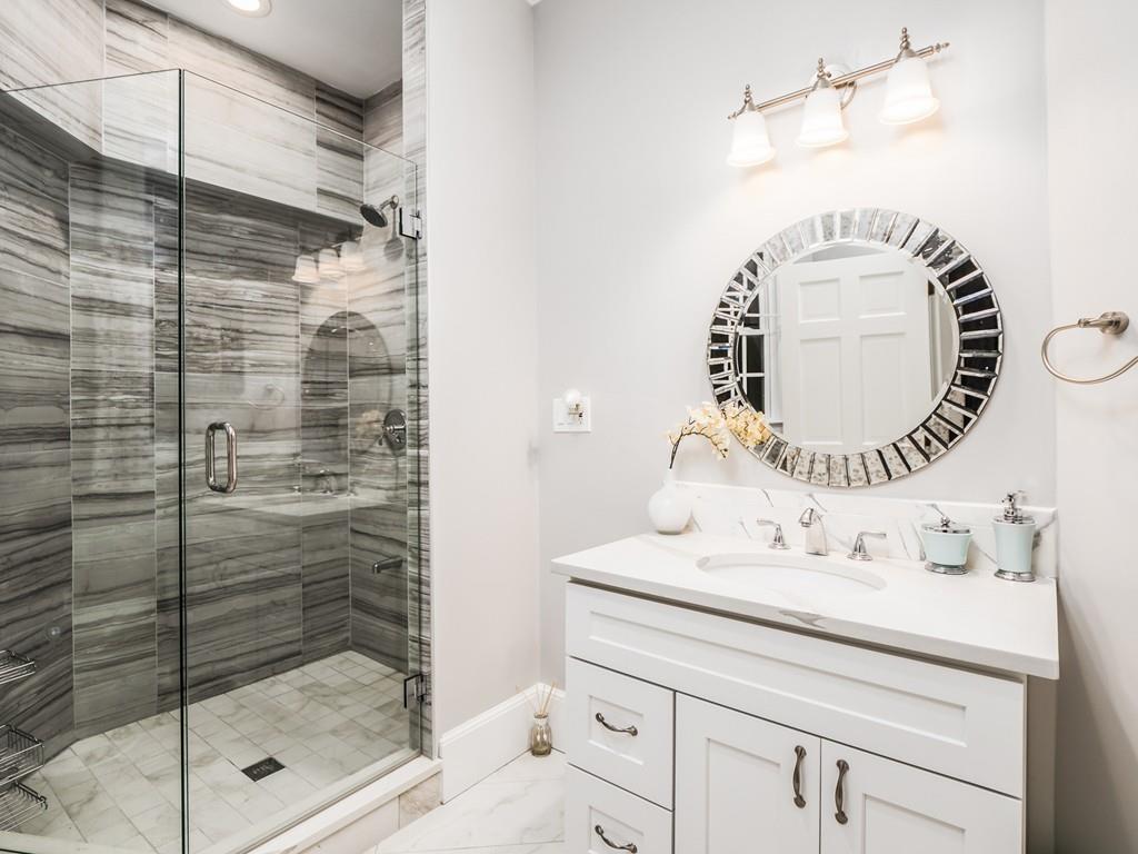 5 Duston Lane Acton, MA 01720 - Photo 20 of 39 a bathroom with a sink and a mirror