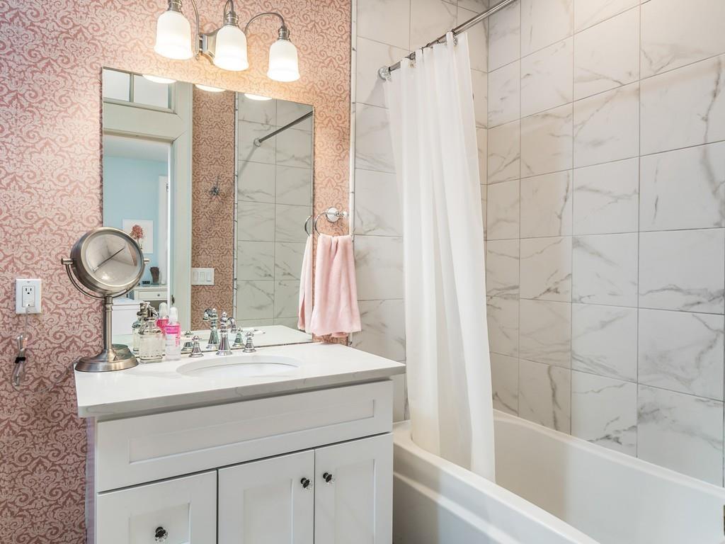 5 Duston Lane Acton, MA 01720 - Photo 26 of 39 a bathroom with a sink and a mirror