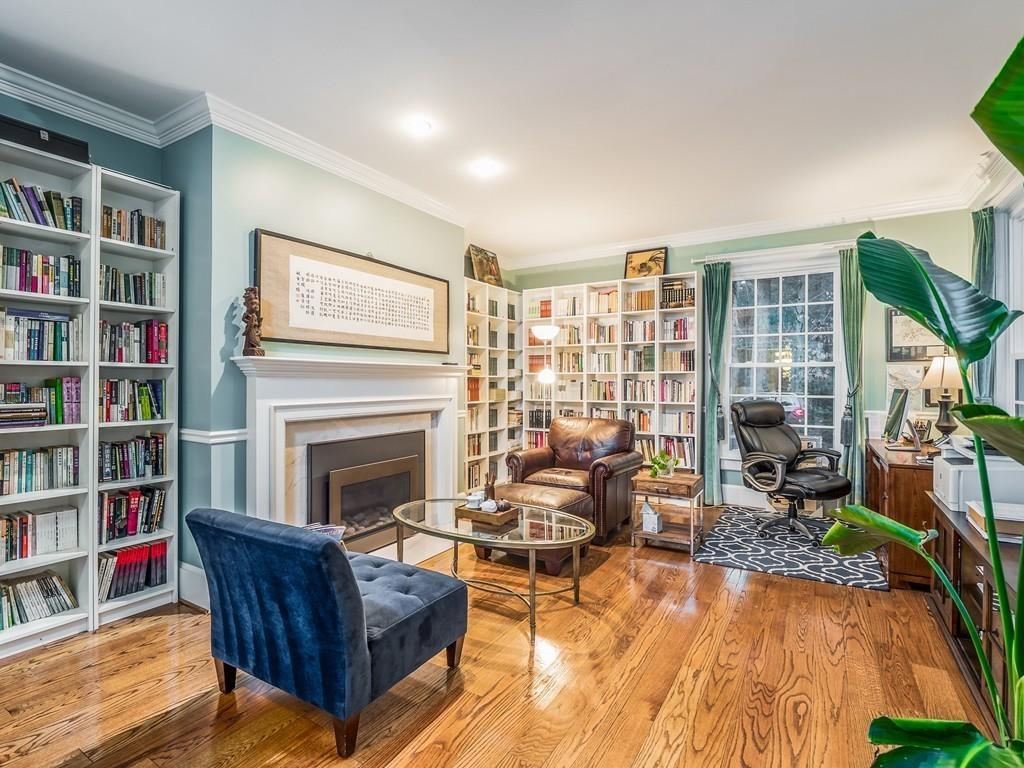 5 Duston Lane Acton, MA 01720 - Photo 7 of 39 a living room with furniture and a fireplace