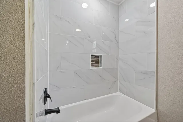 a bathroom with a bathtub