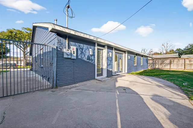 a front view of house along with street