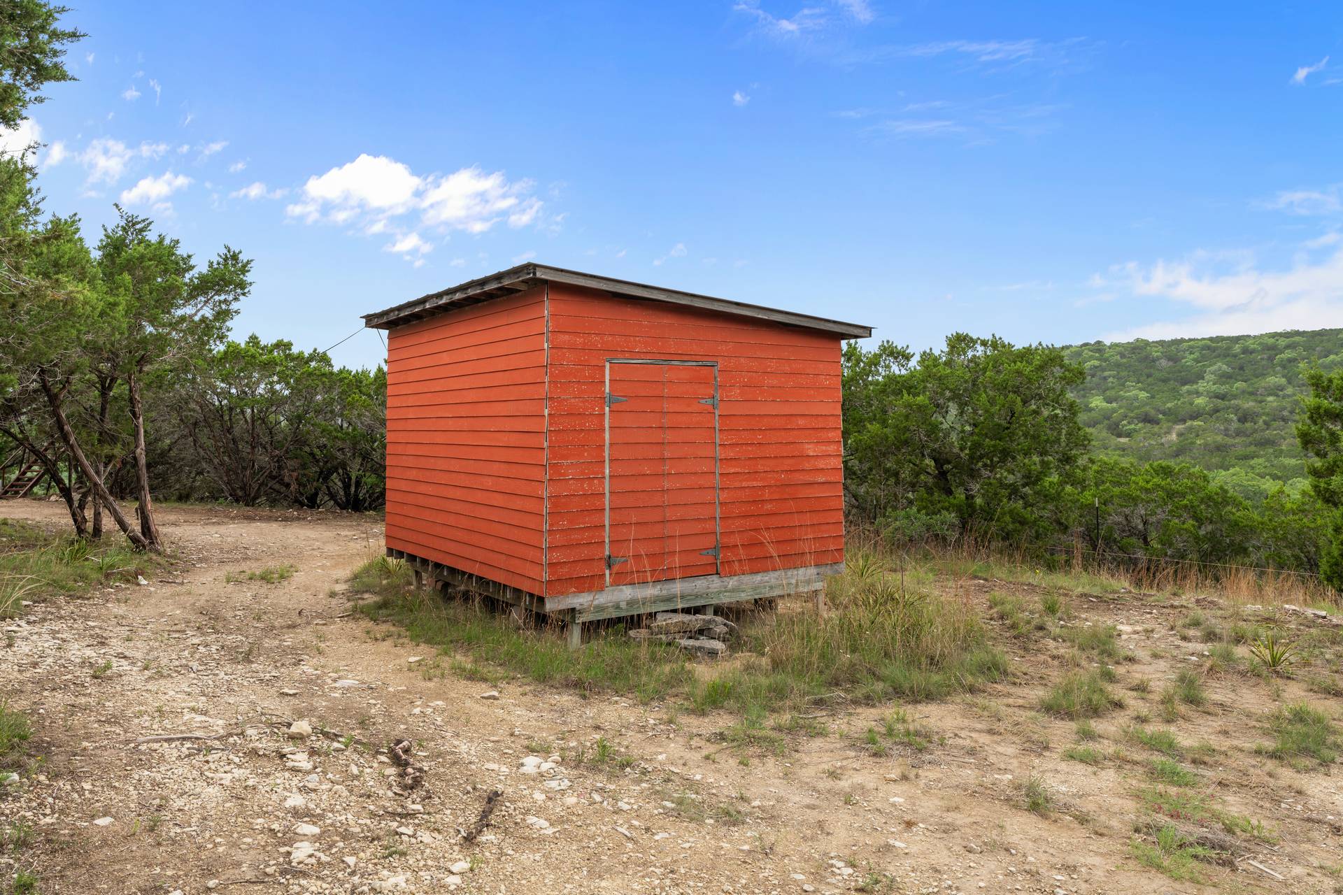 182 Quail Creek Road Marble Falls, TX 78654 - Photo 20 of 20 Original storage building on the property
